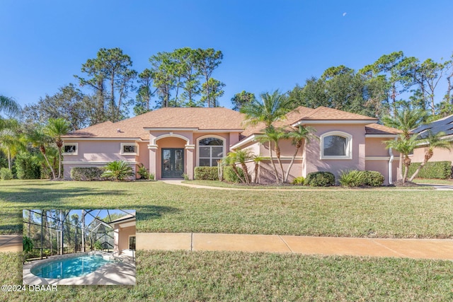 3404 Rexford Cir, Ormond Beach, FL 32174 - mediterranean / spanish-style home with stucco siding and a front lawn