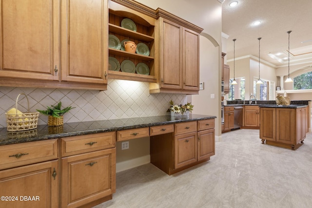 kitchen featuring backsplash, decorative light fixtures, stainless steel dishwasher, and dark stone countertops