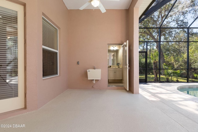 3404 Rexford Cir, Ormond Beach, FL 32174 - view of patio / terrace featuring a ceiling fan, glass enclosure, and an outdoor pool