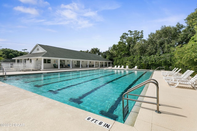 3404 Rexford Cir, Ormond Beach, FL 32174 - community pool featuring a patio