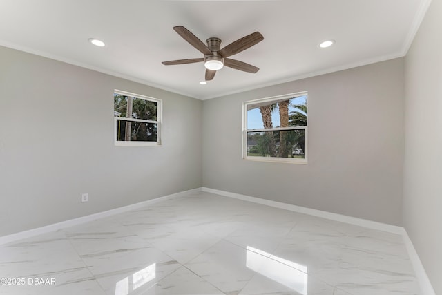 empty room with ceiling fan and ornamental molding