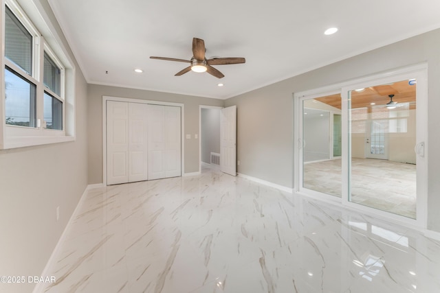 unfurnished bedroom featuring ceiling fan and ornamental molding