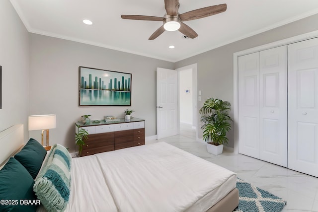 bedroom featuring ceiling fan, ornamental molding, and a closet