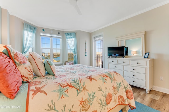 bedroom with multiple windows, crown molding, ceiling fan, and light hardwood / wood-style floors