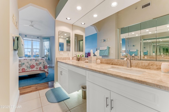 bathroom with vanity, tile patterned floors, and ceiling fan