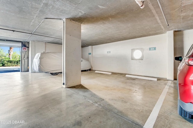 garage featuring a carport