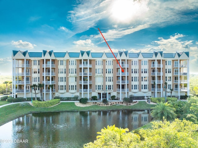 view of building exterior with a water view