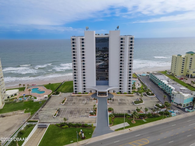 aerial view with a beach view and a water view