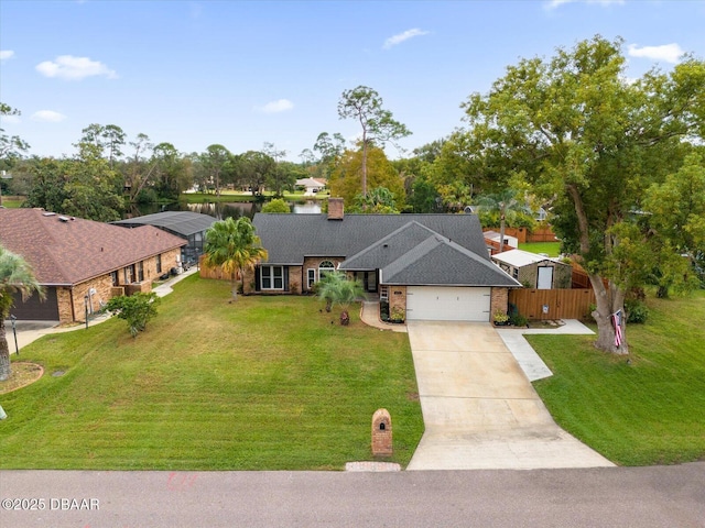 ranch-style home with a front yard and a garage