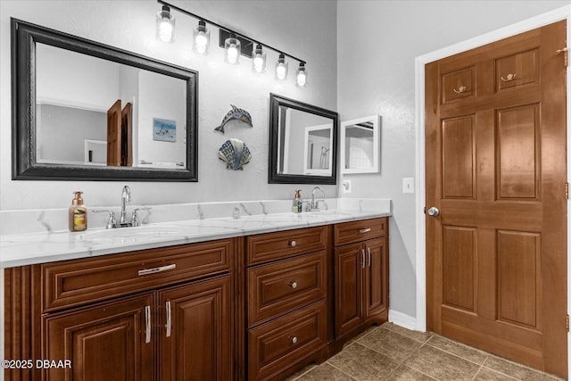 bathroom with vanity and tile patterned floors