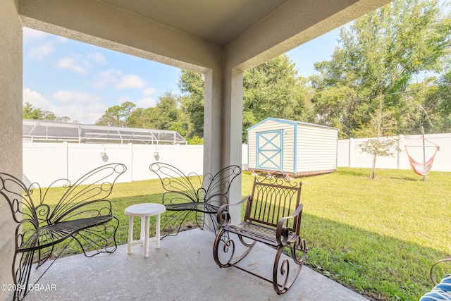 view of patio with a shed