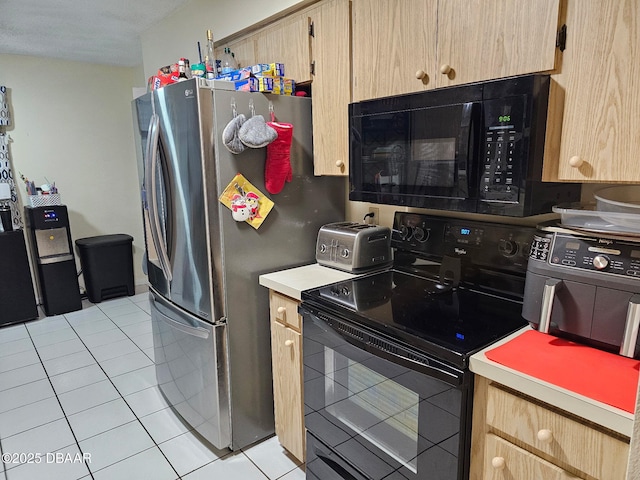 2519 Eustace Ave, Deltona, FL 32725 - kitchen featuring black appliances, light brown cabinetry, and light tile patterned floors