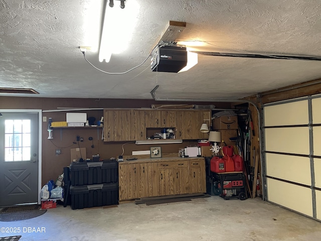 garage featuring a garage door opener