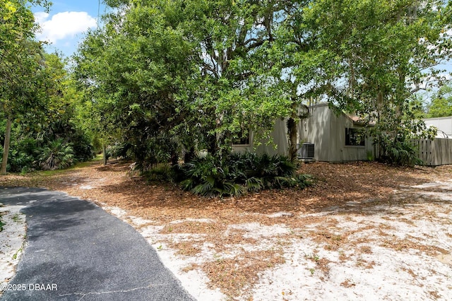 view of property exterior with central AC unit