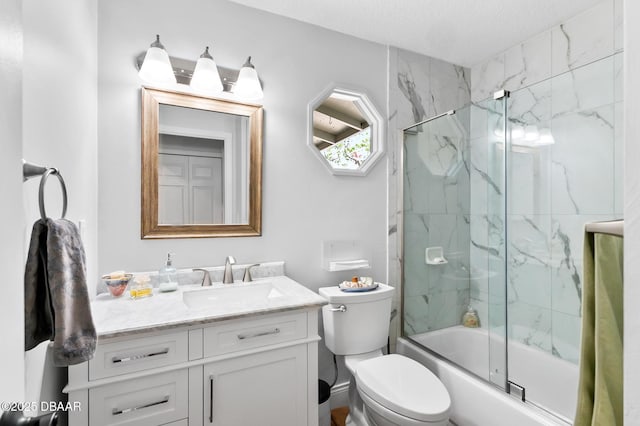 full bath with shower / bath combination with glass door, toilet, and vanity
