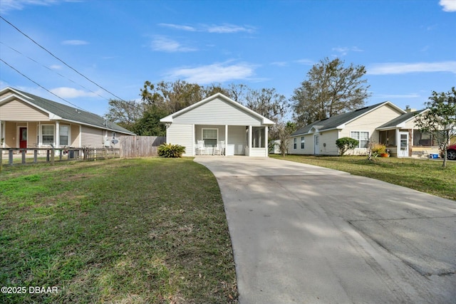 view of front of house with a front yard and a porch