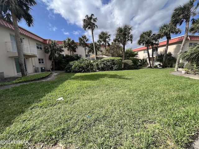 1510 Ocean Shore Blvd Unit 3120, Ormond Beach, FL 32176 - view of grassy yard with central air condition unit