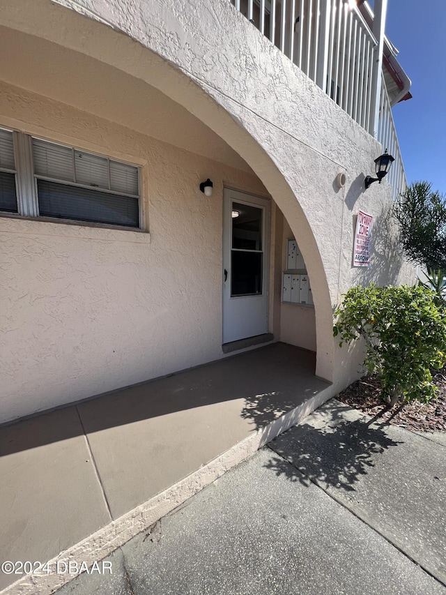 1510 Ocean Shore Blvd Unit 3120, Ormond Beach, FL 32176 - property entrance featuring stucco siding