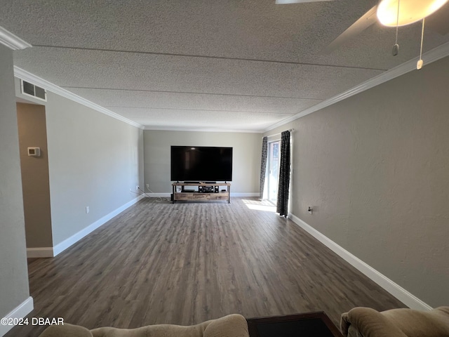 unfurnished living room with ceiling fan, hardwood / wood-style floors, and ornamental molding