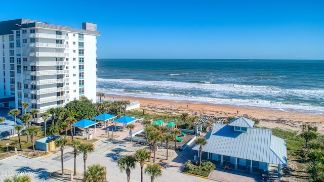 aerial view with a beach view and a water view