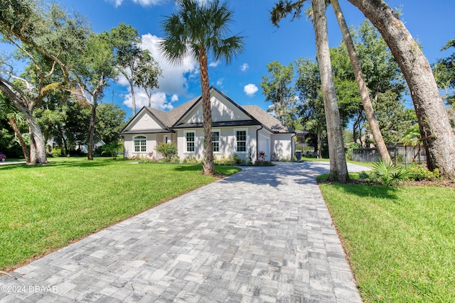 view of front facade with a front yard