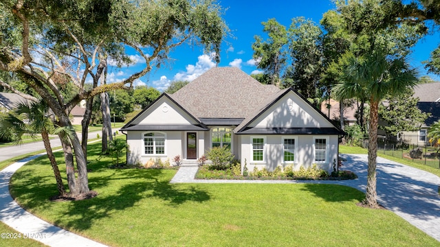 view of front of home featuring a front yard