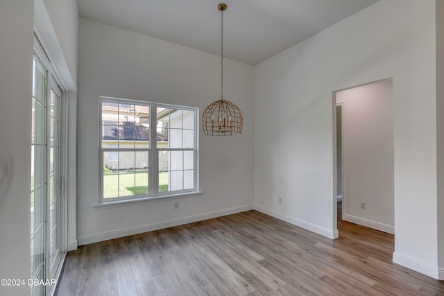 spare room featuring light hardwood / wood-style flooring