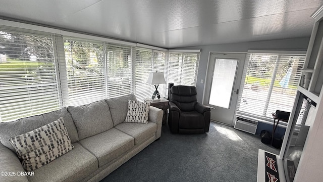 sunroom featuring vaulted ceiling