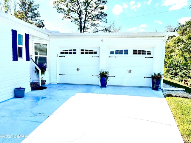 garage with driveway