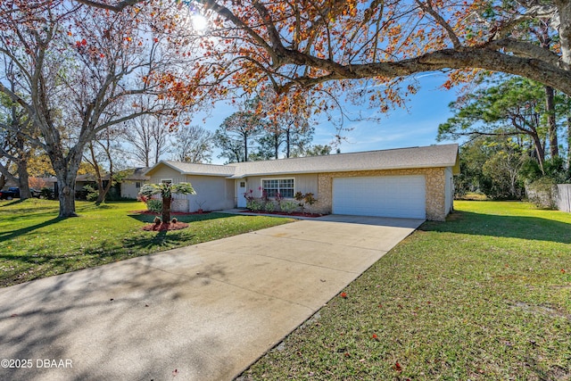 ranch-style house with a garage and a front yard