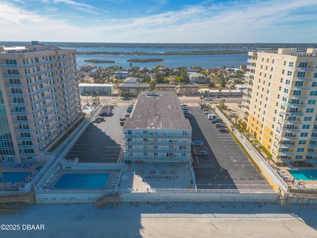 drone / aerial view with a water view