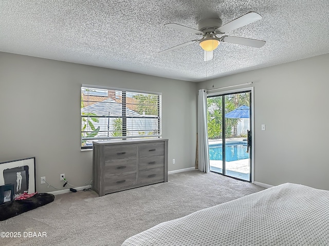 7 Heather Ln, Ormond Beach, FL 32174 - bedroom featuring access to outside, carpet, baseboards, a textured ceiling, and a ceiling fan