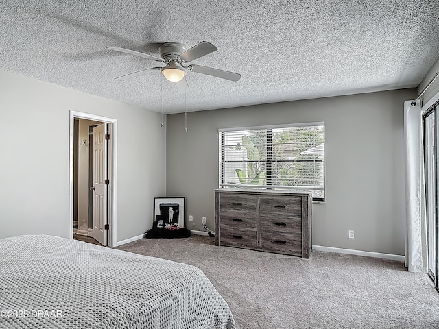 7 Heather Ln, Ormond Beach, FL 32174 - carpeted bedroom featuring a textured ceiling, a ceiling fan, and baseboards