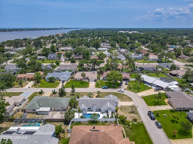 7 Heather Ln, Ormond Beach, FL 32174 - aerial view of residential area featuring a nearby body of water and a pool area