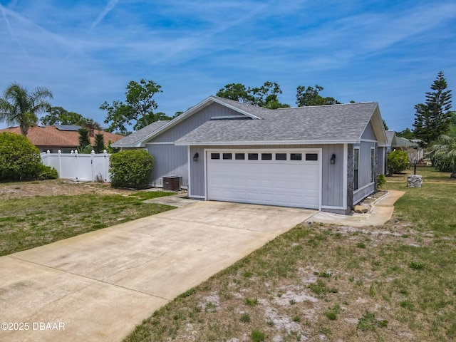 7 Heather Ln, Ormond Beach, FL 32174 - ranch-style home featuring roof with shingles, a garage, driveway, and cooling unit