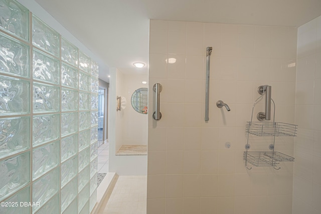 bathroom featuring tiled shower