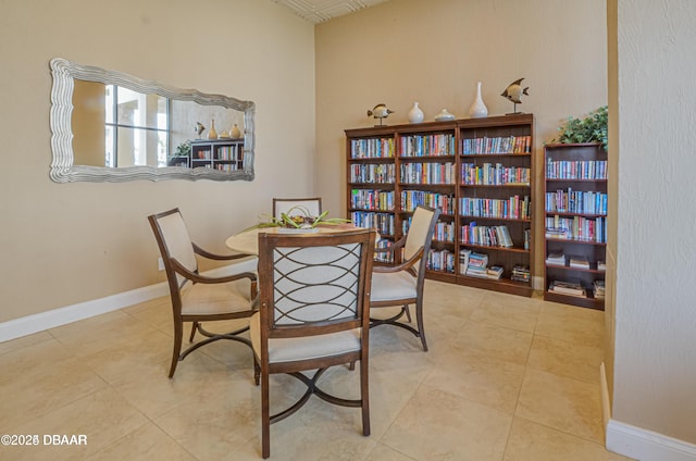 3051 S Atlantic Ave Unit 1806, Daytona Beach Shores, FL 32118 - dining area with baseboards and tile patterned floors