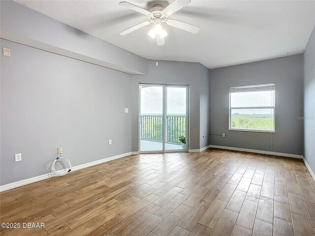 5300 S Atlantic Ave Unit 9-403, New Smyrna Beach, FL 32169 - spare room with wood finished floors, ceiling fan, and baseboards