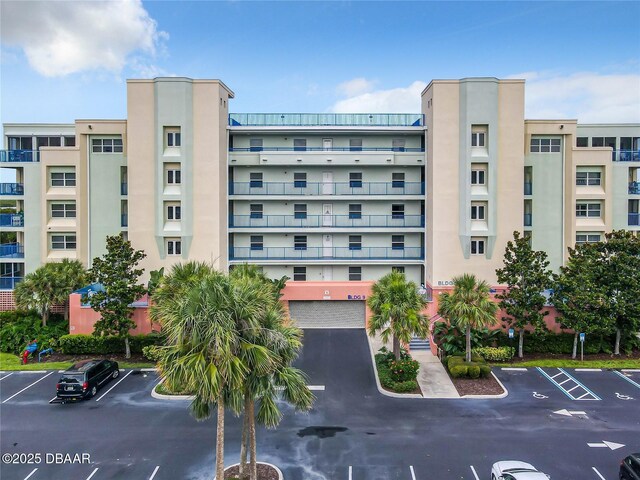 5300 S Atlantic Ave Unit 9-403, New Smyrna Beach, FL 32169 - view of property with uncovered parking