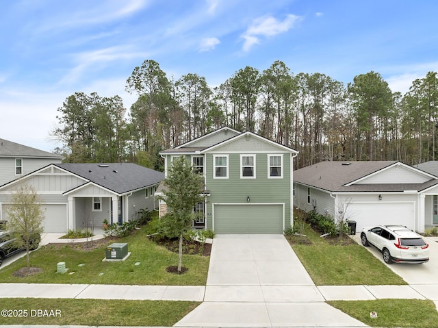 view of front facade featuring a front lawn and a garage