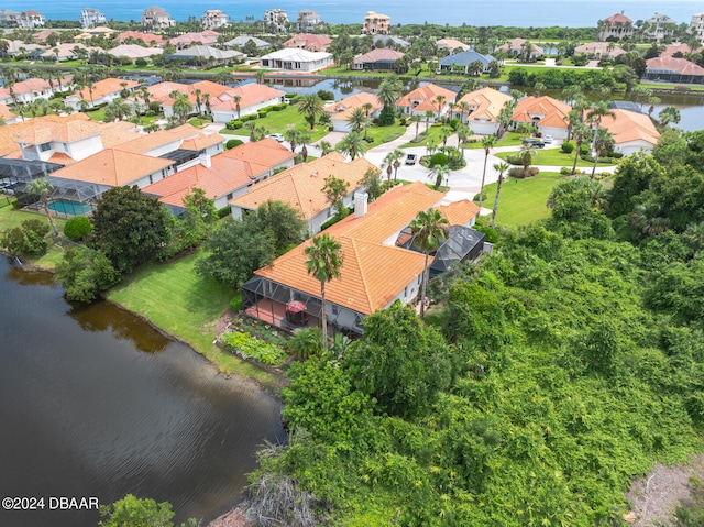 drone / aerial view with a water view