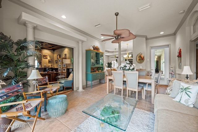 living room with ornamental molding, ceiling fan, decorative columns, and light tile patterned flooring