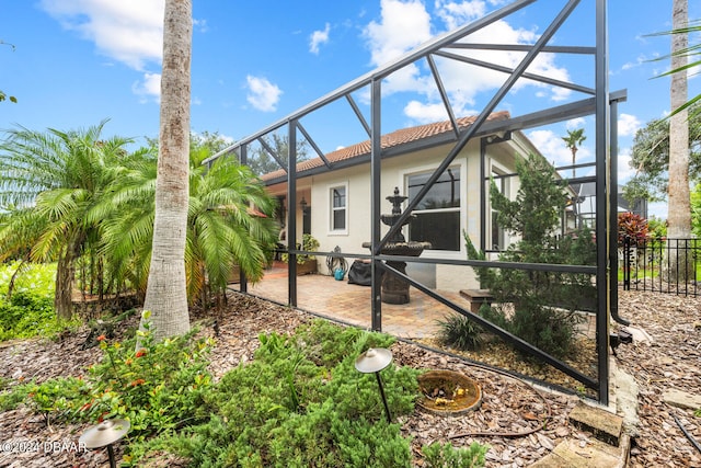 exterior space with a patio area and a lanai