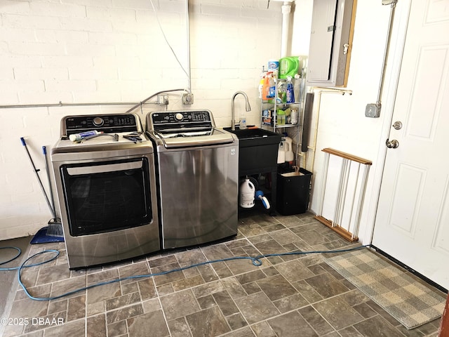 421 University Blvd, Daytona Beach, FL 32118 - washroom featuring washing machine and clothes dryer and electric panel