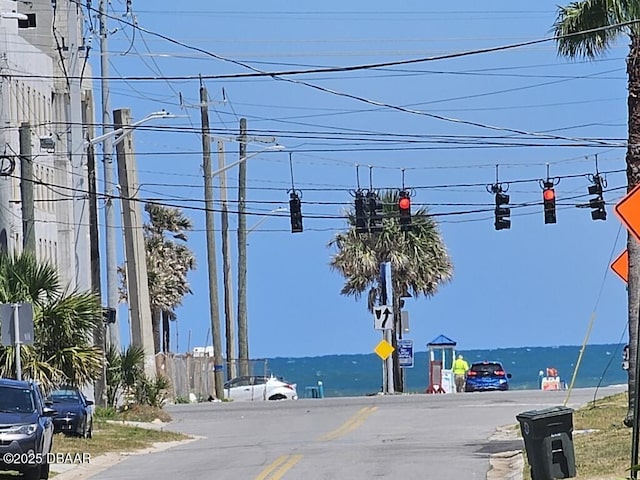 421 University Blvd, Daytona Beach, FL 32118 - view of asphalt street featuring traffic signs, traffic lights, and street lights