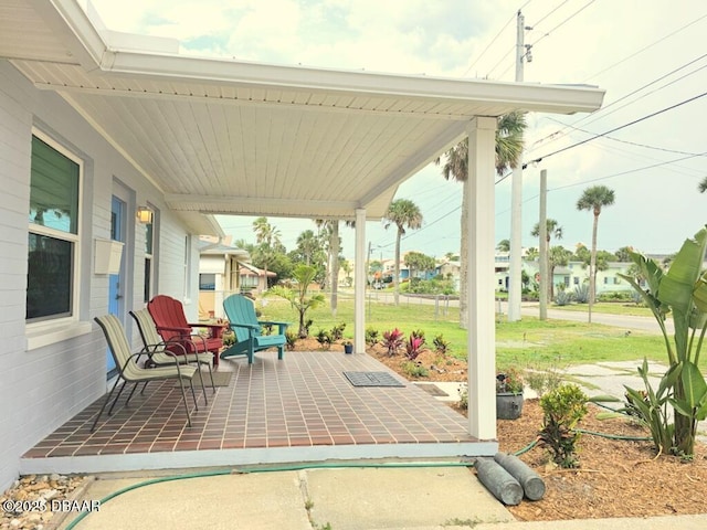 421 University Blvd, Daytona Beach, FL 32118 - porch with a yard