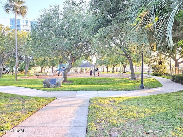 421 University Blvd, Daytona Beach, FL 32118 - view of community featuring a lawn