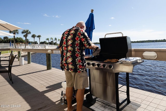3606 S Peninsula Dr Unit 406, Port Orange, FL 32127 - dock area featuring a water view