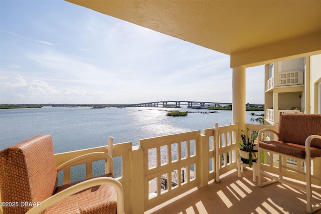 3606 S Peninsula Dr Unit 406, Port Orange, FL 32127 - balcony featuring a water view