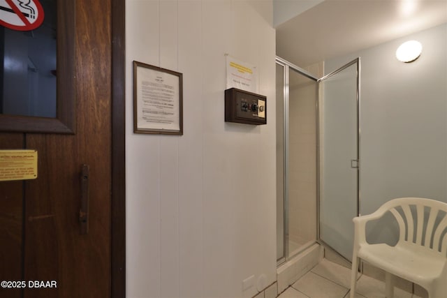 3606 S Peninsula Dr Unit 406, Port Orange, FL 32127 - bathroom with a stall shower and tile patterned floors